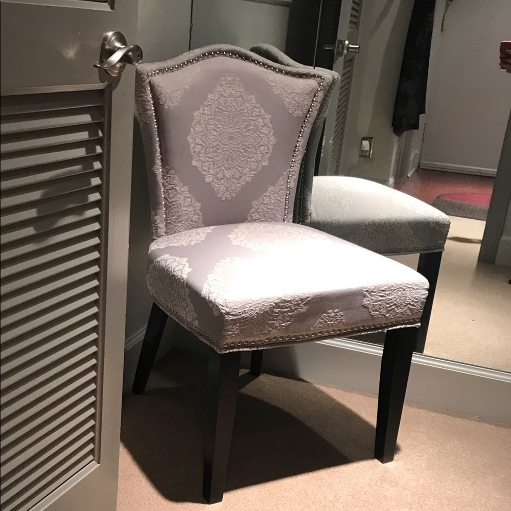 Grey chair with embroidery